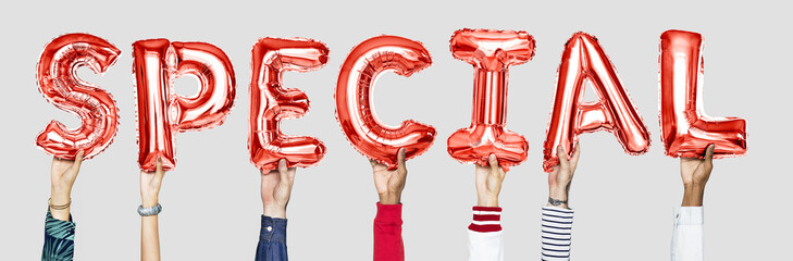 Red alphabet balloons forming the word special