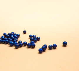 natural lapis lazuli on Orange background