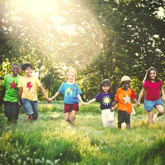 Diverse kids playing in the park