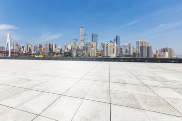 Panoramic skyline and modern business office buildings with empty road,empty concrete square floor