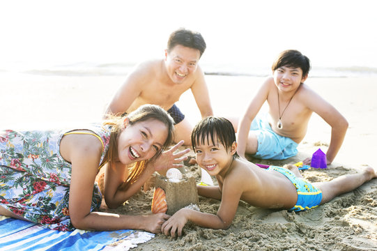 Asian family at the beach
