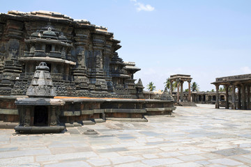 View of stellate, star Shape, form of shrine outer wall at the Chennakeshava temple. Belur, Karnataka. View from West. - obrazy, fototapety, plakaty