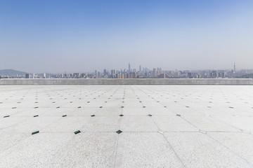 Panoramic skyline and modern business office buildings with empty road,empty concrete square floor