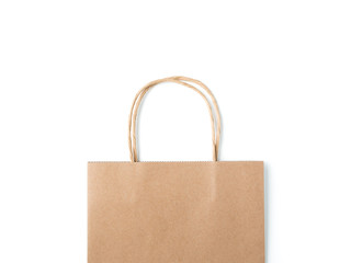 Top view brown paper shopping bag on white background, Mock-up of blank brown paper shopping bag and copy space. Flat lay.
