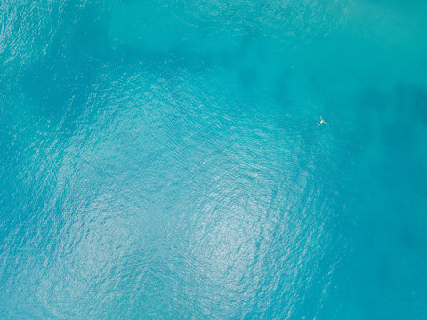 Aerial View Of Man Lost In The Middle Of The Ocean