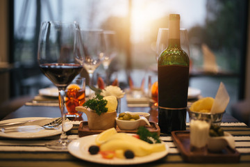 Cheese plates served with tomato and 
olive.