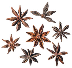 Anise stars. Dried stars with seeds isolated on white background.