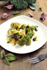 Broccoli baked in bread crumbs, garlic and basil, vertical 