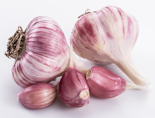 Garlic bulbs and garlic cloves.