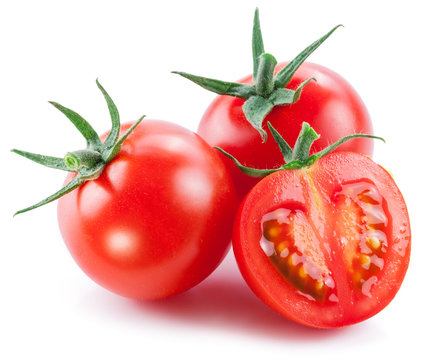 Two Cherry Tomatoes And A Half Of Tomato. White Background.