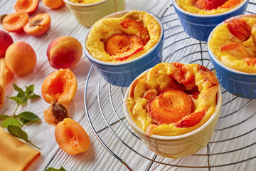 Baked apricot clafoutis placed on the wire rack