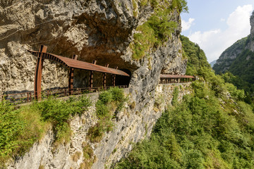 iron shields for falling stones protect nature walk at Via Mala, Scalve canyon, Italy © hal_pand_108