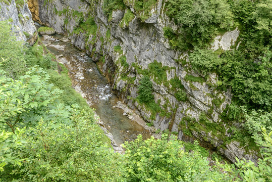 clear waters of Dezzo creek at the bottom of Via Mala gorge, Scalve canyon, Italy