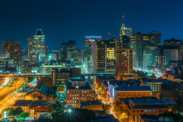 View of the downtown Baltimore skyline at night, in Baltimore, Maryland - obrazy, fototapety, plakaty