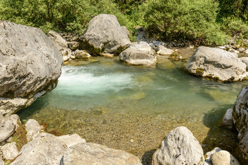 Fototapeta na wymiar rockpool of Dezzo creek at Via Mala gorge, Scalve canyon, Italy