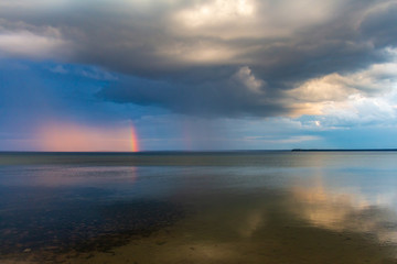 Fototapeta na wymiar Lake Naroch. rainbow over the water
