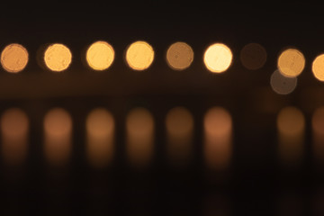 background. defocusing. night, multicolored lights on the bridge \ new year \ christmas.