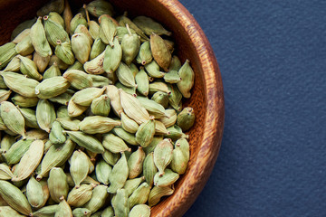 Super food cardamom health food selection in spoon.
