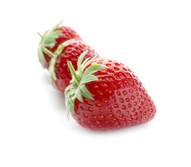 Sweet ripe strawberries on white background