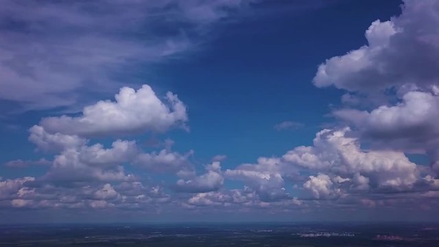 Panorama view from the top of tower. Summer sjy and clouds.