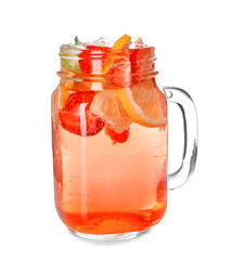 Tasty lemonade with strawberry in mason jar on white background