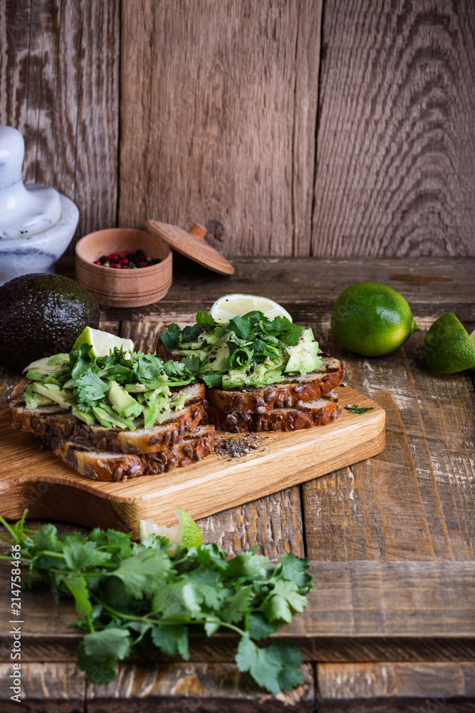 Canvas Prints Fresh avocado toasts with cilantro, Mexican style healthy snack