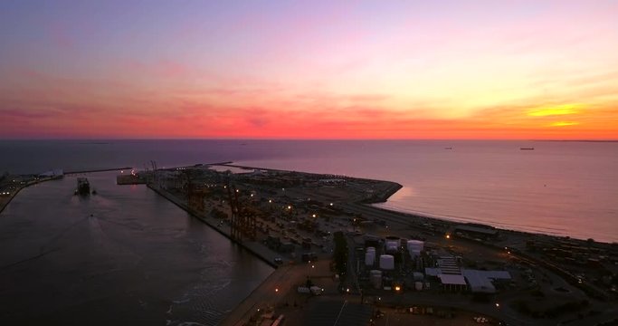 Fremantle Port at dusk. Container Ship in port. Sunset.