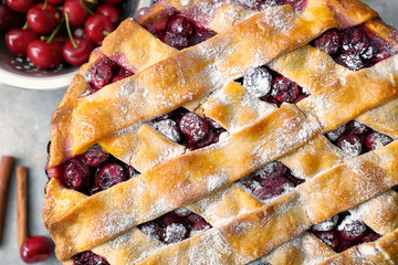 Delicious homemade cherry pie on table, closeup