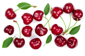 Sweet red cherries with leaves isolated on white background. Top view. Flat lay pattern