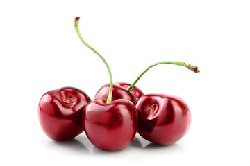 Sweet red cherries isolated on white background macro.
