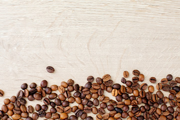  coffee beans on wooden background