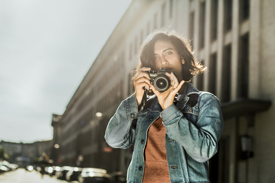 Female photographer in the city
