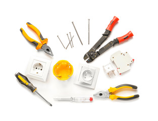 Different electrician's tools and supplies on white background