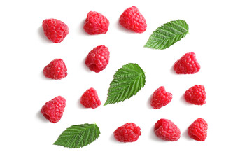 Delicious ripe raspberries with leaves on white background, top view