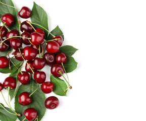 Ripe cherries with leaves on white background