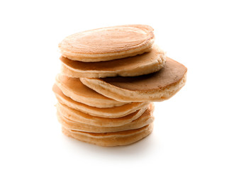 Tasty pancakes on white background