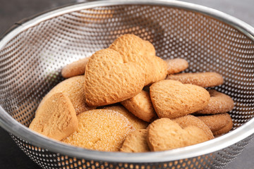 Sweet tasty cookies in bowl, closeup