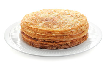 Plate with stack of tasty thin pancakes on white background