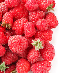 Ripe aromatic raspberries on white background