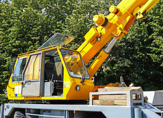 Mobille crane vehicle at the construction site