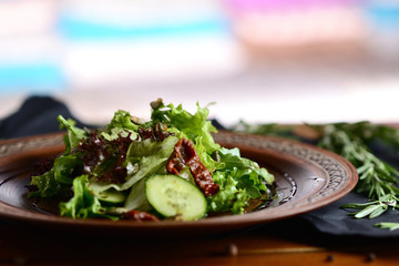 salad with dried tomatoes and pumpkin seeds