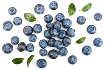 fresh ripe blueberry with leaf isolated on white background. Top view. Flat lay pattern