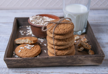 oatmeal cookies with milk and oat flakes