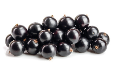 heap of black currant isolated on white background