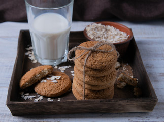 oatmeal cookies with milk and oat flakes