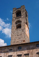 Fototapeta na wymiar Ancient bell tower of the church in Bergamo Alta. Bergamo, Italy