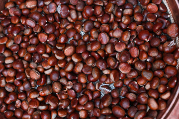 A pan of roasting chestnuts