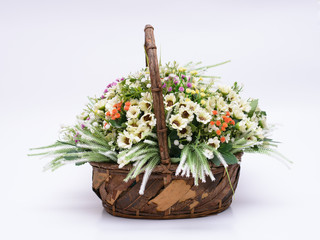 flowers on the wooden basket