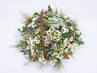 flowers on the wooden basket