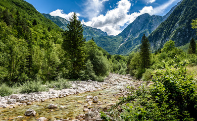Idyllic mountain river in Lepena valley, Soca - Bovec Slovenia. - obrazy, fototapety, plakaty